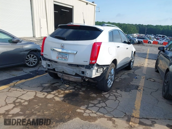 2013 Cadillac SRX Premium Collection with VIN 3GYFNJE33DS625036, listed as a IAAI auction lot 42464711 with 83,344 mi miles and . Bid and sale history available at DreamBid. Image 4.