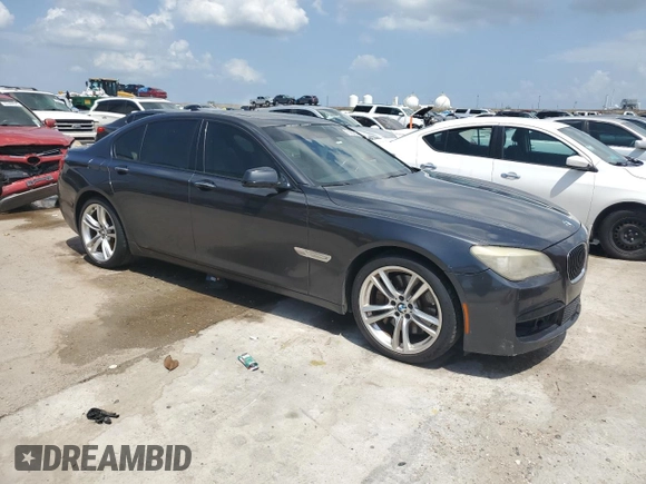 2011 BMW 7 Series 750i with VIN WBAKA8C59BCY36657, listed as a Copart auction lot 61484925 with 174,605 mi miles and Salvage title. Bid and sale history available at DreamBid. Image 4.
