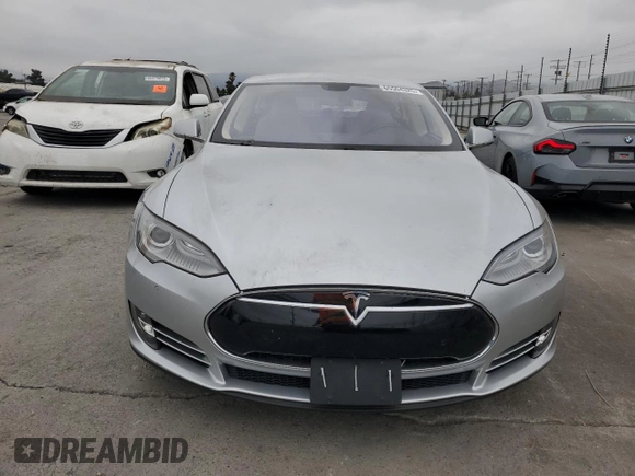 2014 Tesla Model S 60 with VIN 5YJSA1H14EFP34335, listed as a Copart auction lot 65504325 with Not provided miles and Clean title. Bid and sale history available at DreamBid. Image 5.