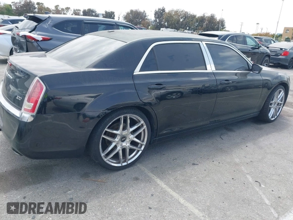 2013 Chrysler 300 with VIN 2C3CCAAG3DH565628, listed as a IAAI auction lot 42110710 with 204,362 mi miles. Bid and sale history available at carsss.com. Image 4.