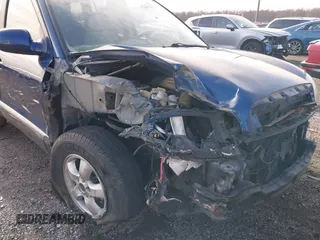 2006 Hyundai Santa Fe GLS with VIN KM8SC13D76U100145, listed as a IAAI auction lot 41093265 with 164,028 mi miles. Bid and sale history available at carsss.com. Image 6.
