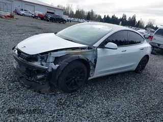 2023 Tesla Model 3 with VIN 5YJ3E1EA2PF612427, listed as a IAAI auction lot 41793756 with 17,913 mi miles and . Bid and sale history available at carsss.com. Image 21.