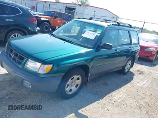 1999 Subaru Forester L with VIN JF1SF6353XH717074, listed as a IAAI auction lot 42697187 with 158,188 mi miles and . Bid and sale history available at DreamBid. Image 2.