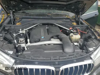 2017 BMW X5 xDrive35i z VIN 5UXKR0C50H0U53714, wystawiony jako Copart lot #57899365 z przebiegiem 124 846 mil mil oraz Szkoda całkowita • Salvage title. Historia ofert i sprzedaży dostępna na DreamBid. Obrazek 11.