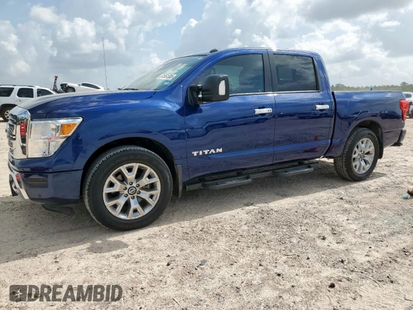 2021 Nissan Titan SV with VIN 1N6AA1EF0MN512559, listed as a Copart auction lot 61561305 with 31,344 mi miles and Salvage title. Bid and sale history available at DreamBid. Image 1.