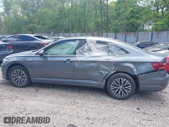 2019 Volkswagen Jetta S z VIN 3VWC57BUXKM121316, wystawiony jako IAAI lot #42290107 z przebiegiem 117 371 mil mil oraz . Historia ofert i sprzedaży dostępna na DreamBid. Obrazek 15.