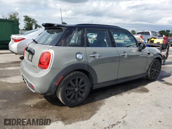 2018 MINI Hardtop 4 Door Cooper S с VIN WMWXU3C5XJ2F51599, выставлен на аукционе Copart как лот 59171195 с пробегом 53 484 миль миль и Списание • Salvage title. История ставок и продаж доступна на DreamBid. Изображение 3.