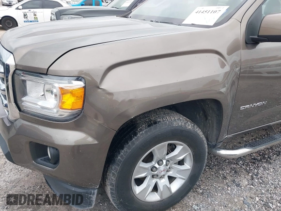 2016 GMC Canyon 2WD SLE with VIN 1GTG5CE34G1154106, listed as a IAAI auction lot 41451107 with 245,087 mi miles. Bid and sale history available at carsss.com. Image 6.