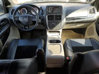 2016 Dodge Grand Caravan SXT with VIN 2C4RDGCG5GR219517, listed as a Copart auction lot 50052405 with 104,552 mi miles and Salvage Title. Bid and sale history available at DreamBid. Image 8.