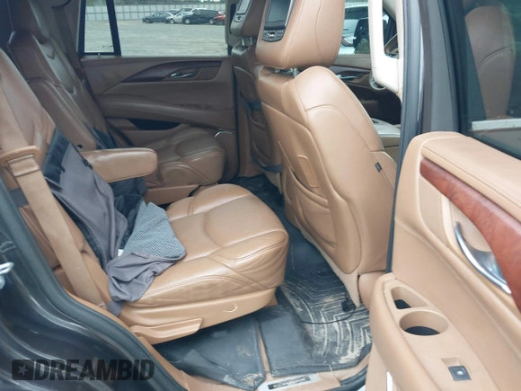 2016 Cadillac Escalade Platinum z VIN 1GYS4DKJ1GR363238, wystawiony jako IAAI lot #40974636 z przebiegiem 128 296 mil mil oraz . Historia ofert i sprzedaży dostępna na DreamBid. Obrazek 8.