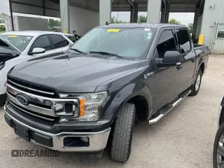 2019 Ford F-150 XL with VIN 1FTEW1CBXKKC55723, listed as a IAAI auction lot 42043971 with 141,959 mi miles and . Bid and sale history available at carsss.com. Image 1.