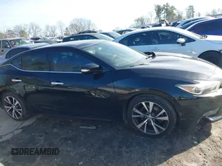 2017 Nissan Maxima SV with VIN 1N4AA6AP7HC438109, listed as a IAAI auction lot 41440985 with 76,153 mi miles. Bid and sale history available at carsss.com. Image 13.