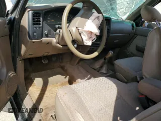 1996 Toyota Tacoma z VIN 4TAWM72N5TZ191278, wystawiony jako Copart lot #57338965 z przebiegiem 233 749 mil mil oraz Szkoda całkowita • Salvage title. Historia ofert i sprzedaży dostępna na DreamBid. Obrazek 8.