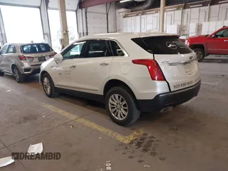 2017 Cadillac XT5 FWD with VIN 1GYKNARS7HZ121596, listed as a IAAI auction lot 41825879 with 82,023 mi miles and . Bid and sale history available at DreamBid. Image 3.