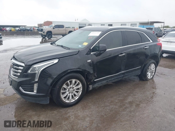 2017 Cadillac XT5 FWD with VIN 1GYKNARS0HZ317508, listed as a IAAI auction lot 40818768 with 132,598 mi miles. Bid and sale history available at carsss.com. Image 2.
