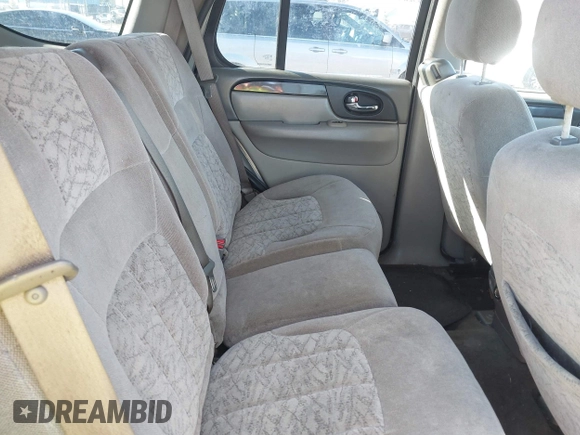 2004 GMC Envoy SLE with VIN 1GKDT13S642213710, listed as a IAAI auction lot 41680656 with 239,187 mi miles. Bid and sale history available at carsss.com. Image 8.
