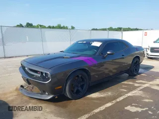 2014 Dodge Challenger R/T с VIN 2C3CDYBT8EH274089, выставлен на аукционе IAAI как лот 42392332 с пробегом 150 254 миль миль и . История ставок и продаж доступна на DreamBid. Изображение 2.