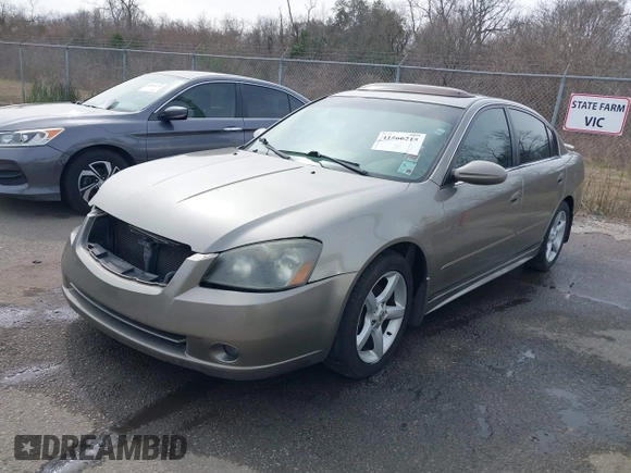 2006 Nissan Altima SL z VIN 1N4BL11D96C251717, wystawiony jako IAAI lot #41566215 z przebiegiem 189 431 mil mil oraz . Historia ofert i sprzedaży dostępna na DreamBid. Obrazek 17.
