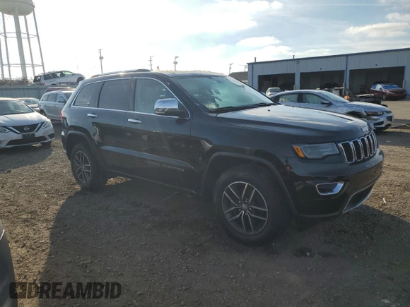 2018 Jeep Grand Cherokee Limited with VIN 1C4RJFBG0JC298468, listed as a Copart auction lot 82975214 with 57,499 mi miles and Salvage Title. Bid and sale history available at carsss.com. Image 4.