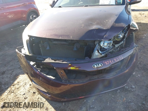 2015 Kia Optima LX with VIN 5XXGM4A79FG384762, listed as a IAAI auction lot 40919391 with 183,379 mi miles. Bid and sale history available at carsss.com. Image 6.