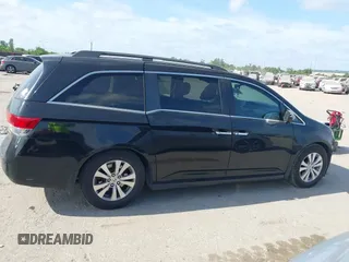 2015 Honda Odyssey EX-L with VIN 5FNRL5H68FB094983, listed as a IAAI auction lot 42031539 with 231,144 mi miles and . Bid and sale history available at DreamBid. Image 14.