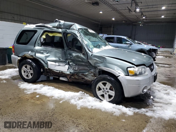 2005 Ford Escape Hybrid with VIN 1FMCU96H55KB87200, listed as a Copart auction lot 44643455 with Not provided miles and Salvage title. Bid and sale history available at DreamBid. Image 4.
