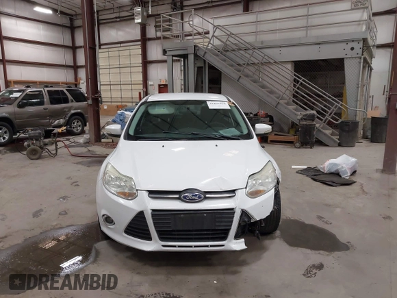2013 Ford Focus SE with VIN 1FADP3F21DL341649, listed as a IAAI auction lot 42465450 with 180,219 mi miles and . Bid and sale history available at DreamBid. Image 13.