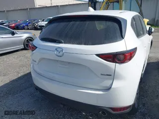 2021 Mazda CX-5 Grand Touring with VIN JM3KFADM2M0306706, listed as a IAAI auction lot 41774357 with 41,117 mi miles. Bid and sale history available at carsss.com. Image 16.