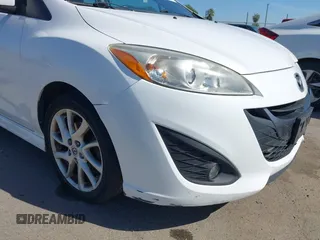 2012 Mazda 5 Touring with VIN JM1CW2CL7C0140452, listed as a IAAI auction lot 41970209 with 92,069 mi miles and . Bid and sale history available at DreamBid. Image 20.