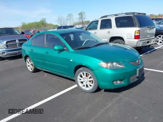 2009 Mazda Mazda3 i Touring Value with VIN JM1BK32F491237992, listed as a IAAI auction lot 41937670 with 163,549 mi miles. Bid and sale history available at carsss.com. Image 1.