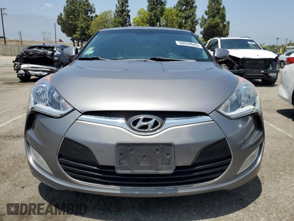2014 Hyundai Veloster z VIN KMHTC6AD9EU200511, wystawiony jako Copart lot #59934645 z przebiegiem 176 436 mil mil oraz Czysty tytuł • Clean title. Historia ofert i sprzedaży dostępna na DreamBid. Obrazek 5.