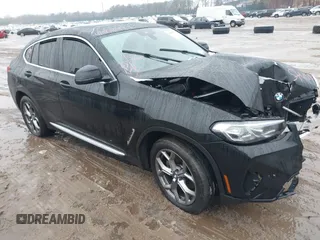 2023 BMW X4 xDrive30i with VIN 5UX33DT05P9R43464, listed as a IAAI auction lot 41507571 with 32,914 mi miles. Bid and sale history available at carsss.com. Image 1.
