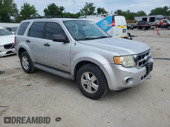 2008 Ford Escape XLS with VIN 1FMCU02Z88KE22266, listed as a Copart auction lot 63067385 with 214,026 mi miles and Salvage title. Bid and sale history available at DreamBid. Image 4.