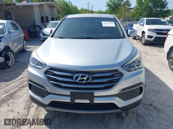 2018 Hyundai Santa Fe 2.4L z VIN 5XYZTDLB9JG513584, wystawiony jako IAAI lot #42031291 z przebiegiem 131 109 mil mil oraz . Historia ofert i sprzedaży dostępna na DreamBid. Obrazek 12.