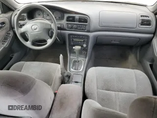 2002 Mazda 626 LX with VIN 1YVGF22C825293243, listed as a Copart auction lot 61084684 with 217,339 mi miles and Salvage Title. Bid and sale history available at carsss.com. Image 8.