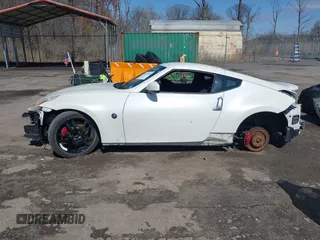 2014 Nissan 370Z with VIN JN1AZ4EH8EM634403, listed as a IAAI auction lot 41923568 with 137,676 mi miles. Bid and sale history available at carsss.com. Image 14.