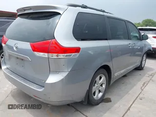 2013 Toyota Sienna LE AAS with VIN 5TDKK3DC0DS300178, listed as a IAAI auction lot 42189800 with 265,568 mi miles and . Bid and sale history available at DreamBid. Image 4.