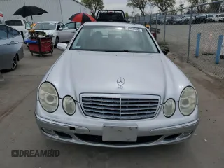 2003 Mercedes-Benz E-Class 5.0L with VIN WDBUF70J03A112909, listed as a Copart auction lot 49924865 with 158,244 mi miles and Salvage Title. Bid and sale history available at carsss.com. Image 5.