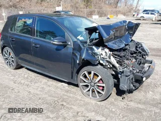 2012 Volkswagen GTI w/Sunroof & Navi PZEV z VIN WVWGD7AJXCW209878, wystawiony jako IAAI lot #41860048 z przebiegiem 154 266 mil mil oraz . Historia ofert i sprzedaży dostępna na DreamBid. Obrazek 1.
