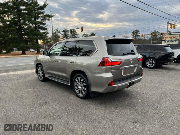 2016 Lexus LX 570 with VIN JTJHY7AX7G4203810, listed as a Copart auction lot 86017494 with 296,703 mi miles and Clean Title. Bid and sale history available at DreamBid. Image 3.