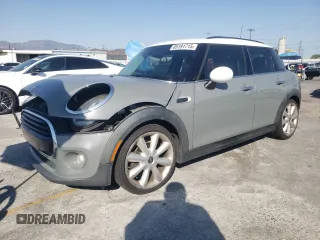 2016 MINI Hardtop 4 Door z VIN WMWXU1C59G2D11117, wystawiony jako Copart lot #65191715 z przebiegiem 121 633 mil mil oraz Szkoda całkowita • Salvage title. Historia ofert i sprzedaży dostępna na DreamBid. Obrazek 1.