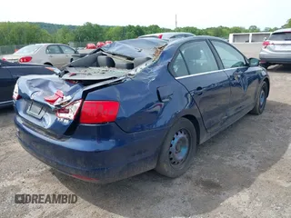 2013 Volkswagen Jetta SE z VIN 3VWDP7AJ0DM292598, wystawiony jako IAAI lot #42360798 z przebiegiem 169 885 mil mil oraz . Historia ofert i sprzedaży dostępna na DreamBid. Obrazek 4.