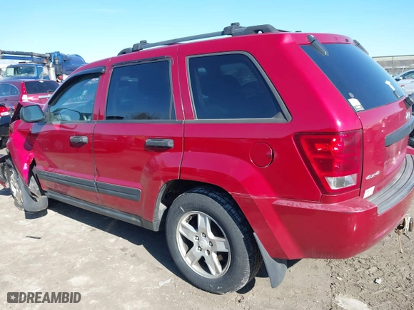 2005 Jeep Grand Cherokee Laredo with VIN 1J4GR48K55C651268, listed as a IAAI auction lot 41987117 with 189,974 mi miles. Bid and sale history available at carsss.com. Image 15.