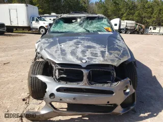 2015 BMW X5 xDrive50i with VIN 5UXKR6C52F0J73938, listed as a Copart auction lot 50601165 with 0 mi miles and Salvage Title. Bid and sale history available at carsss.com. Image 5.