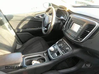 2015 Chrysler 200 Limited with VIN 1C3CCCAB5FN531197, listed as a IAAI auction lot 41353028 with 143,817 mi miles and . Bid and sale history available at carsss.com. Image 5.
