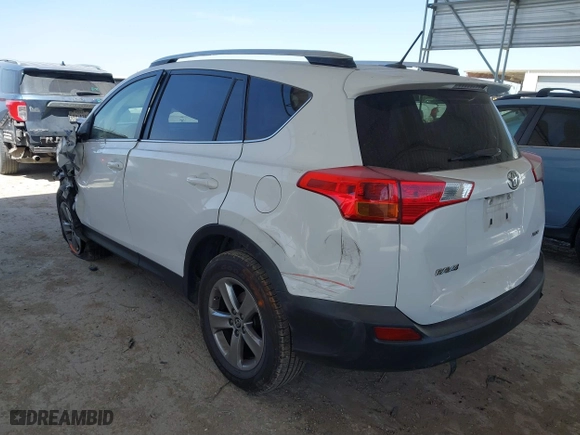 2015 Toyota RAV4 XLE with VIN JTMWFREVXFD066557, listed as a IAAI auction lot 41825354 with 173,595 mi miles. Bid and sale history available at carsss.com. Image 3.