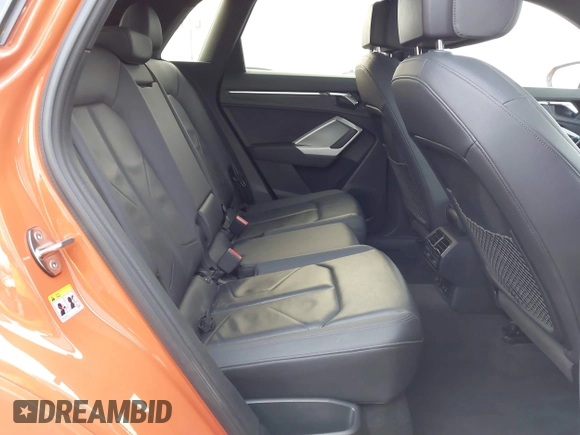 2021 Audi Q3 Premium with VIN WA1AUCF30M1137042, listed as a IAAI auction lot 41502456 with 61,742 mi miles and . Bid and sale history available at DreamBid. Image 8.