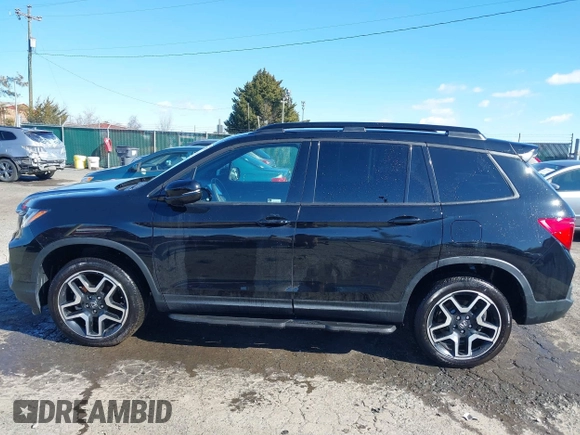 2023 Honda Passport Elite with VIN 5FNYF8H04PB006514, listed as a IAAI auction lot 41537826 with 14,640 mi miles and . Bid and sale history available at DreamBid. Image 15.