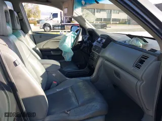 2003 Honda Pilot EX with VIN 2HKYF18633H599550, listed as a IAAI auction lot 41813549 with 242,103 mi miles. Bid and sale history available at carsss.com. Image 5.
