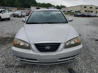 2004 Hyundai Elantra GLS z VIN KMHDN46D34U859307, wystawiony jako Copart lot #53847235 z przebiegiem 91 939 mil mil oraz Szkoda całkowita • Salvage title. Historia ofert i sprzedaży dostępna na DreamBid. Obrazek 5.